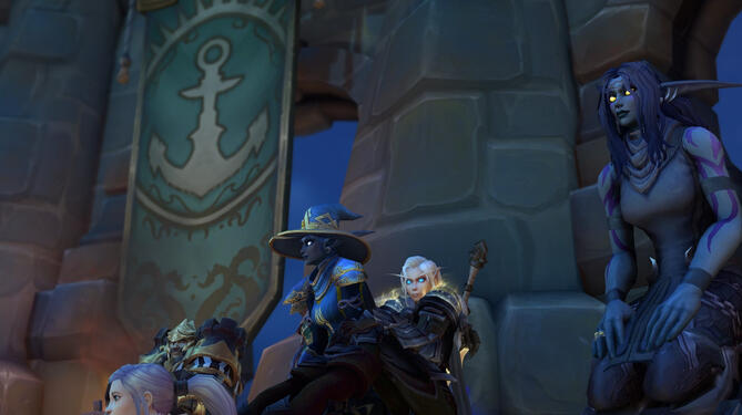 Audience members enjoying the festivities—laughter, chatter, and plenty of card talk in the air.